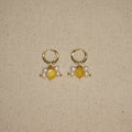 Bumble Bee earrings with yellow mother-of-pearl and pearl cluster details