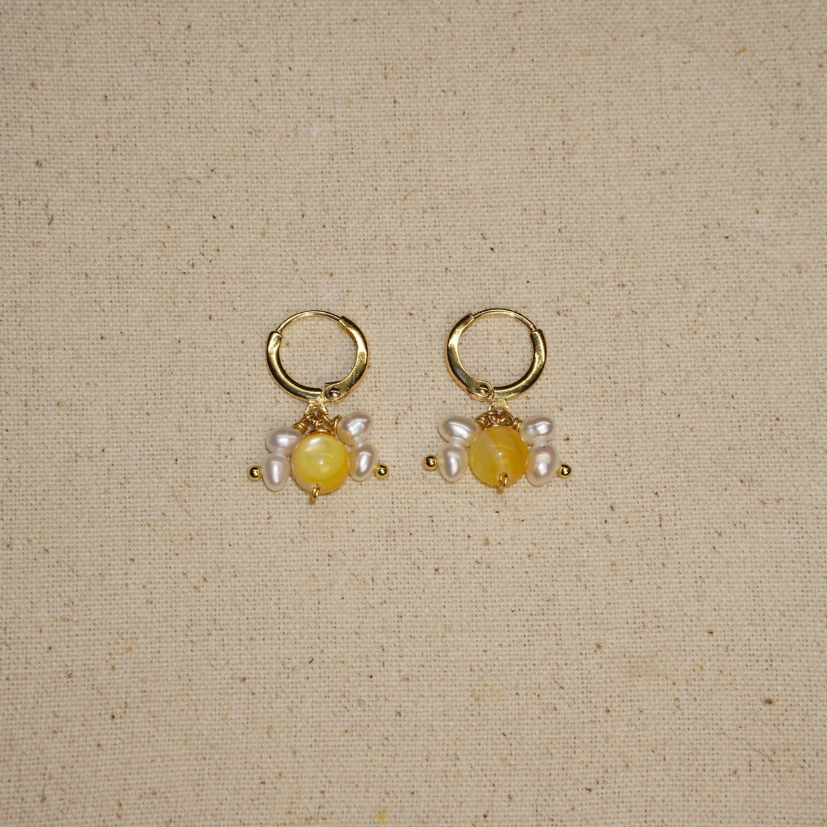 Bumble Bee earrings with yellow mother-of-pearl and pearl cluster details