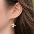Cloche Pearl Drop Earrings close-up on model