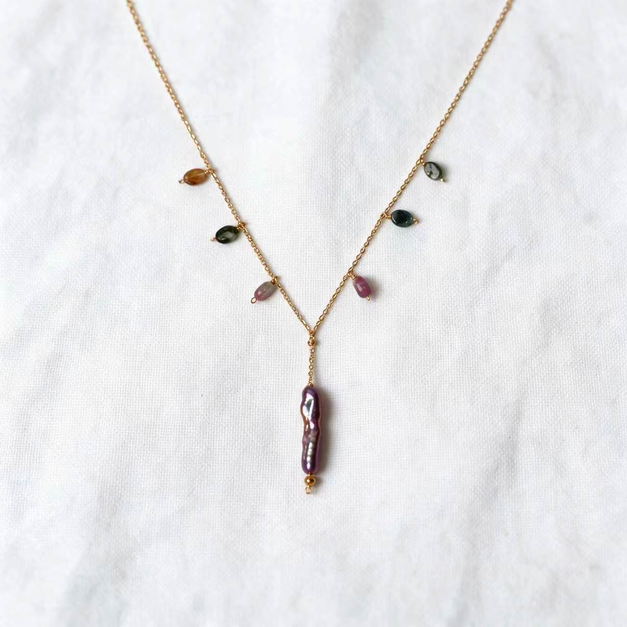 Viola Necklace with multicolored tourmaline stones and a mauve-purple baroque pearl on a 14k gold-filled chain